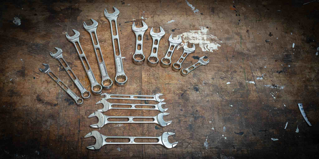 All Asahi wrenches group on workbench